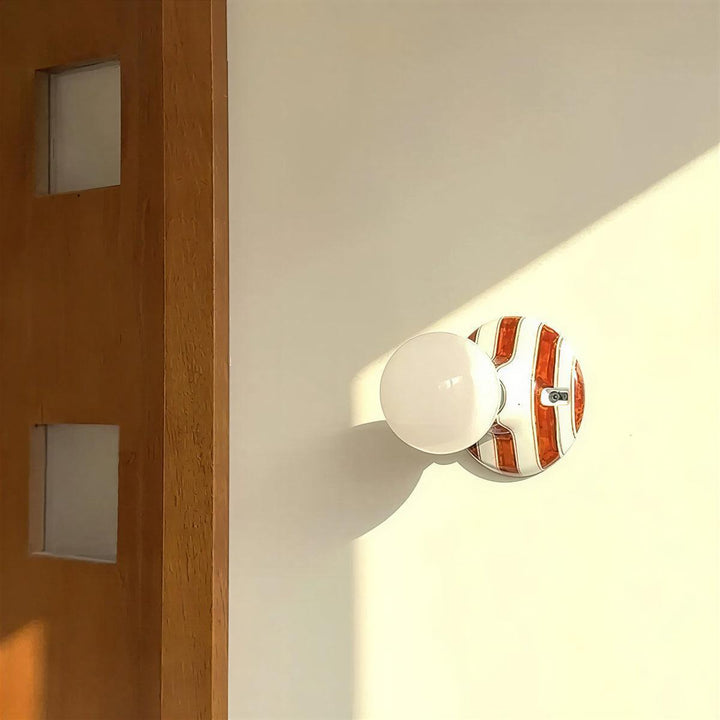 Wall Light Sconce With Striped Spherical Illumination