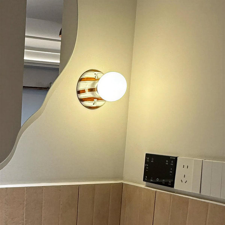 Wall Light Sconce With Striped Spherical Illumination