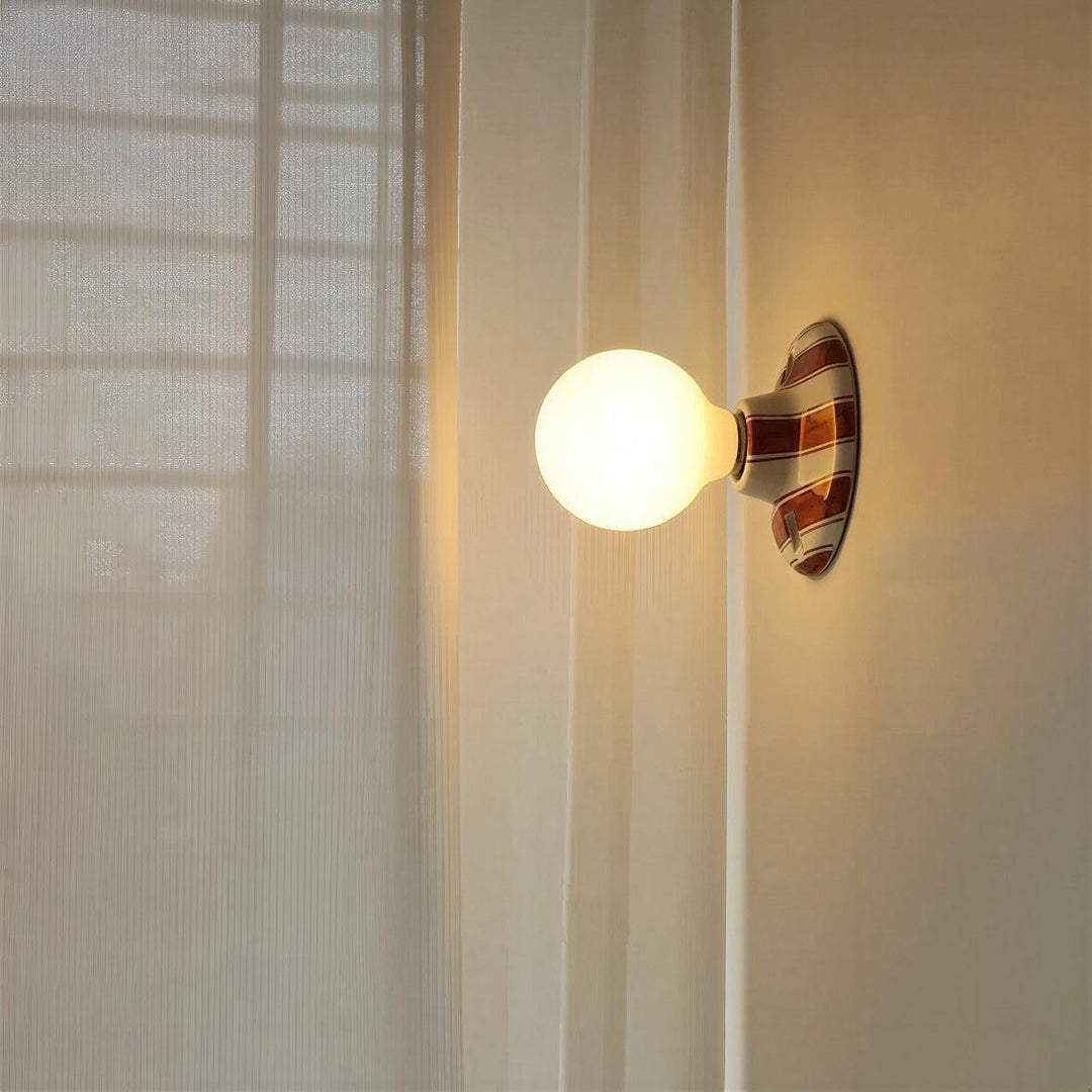 Wall Light Sconce With Striped Spherical Illumination